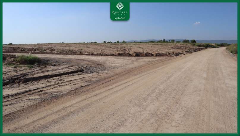 Development work in Block M of Qurtaba City is progressing at a rapid pace. Earthwork and road marking and construction are underway with full momentum, while preparations for the installation of sewerage lines are also in full swing.