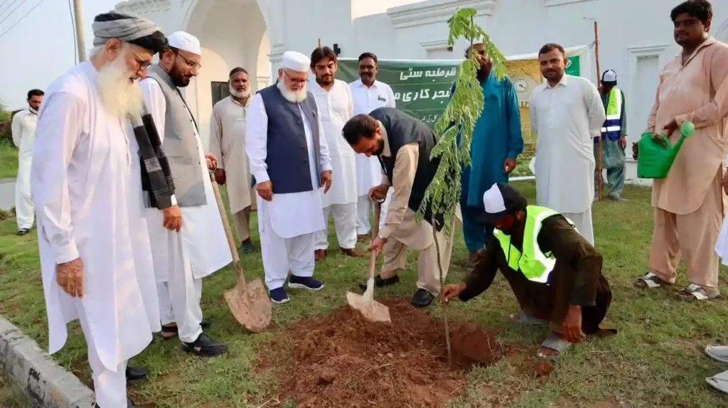 Planting trees at Qurtaba House, featured among top 10 housing societies in Rawalpindi Islamabad